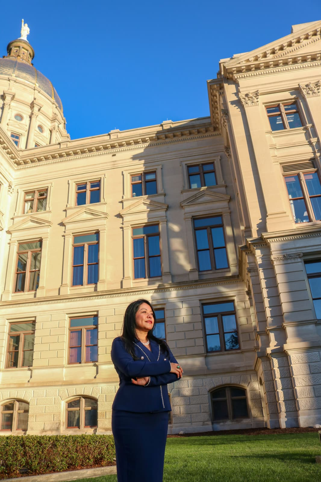 Brenda López Romero standing outside the Georgia State Capitol